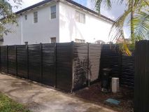 in cape coral florida a dark custom aluminum fence surrounding association