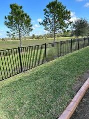 new aluminum fence installation around a home in cape coral florida