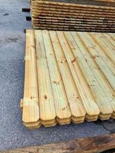 material for a new commercial fence installation in cape coral ready to be loaded onto the delivery truck