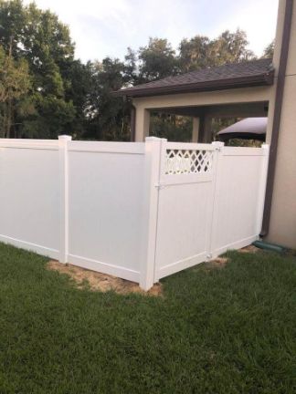 cape coral home with a vinyl privacy fence